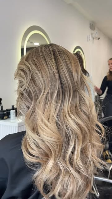 Dimensional blonde waves styled by Adel Shulyanova